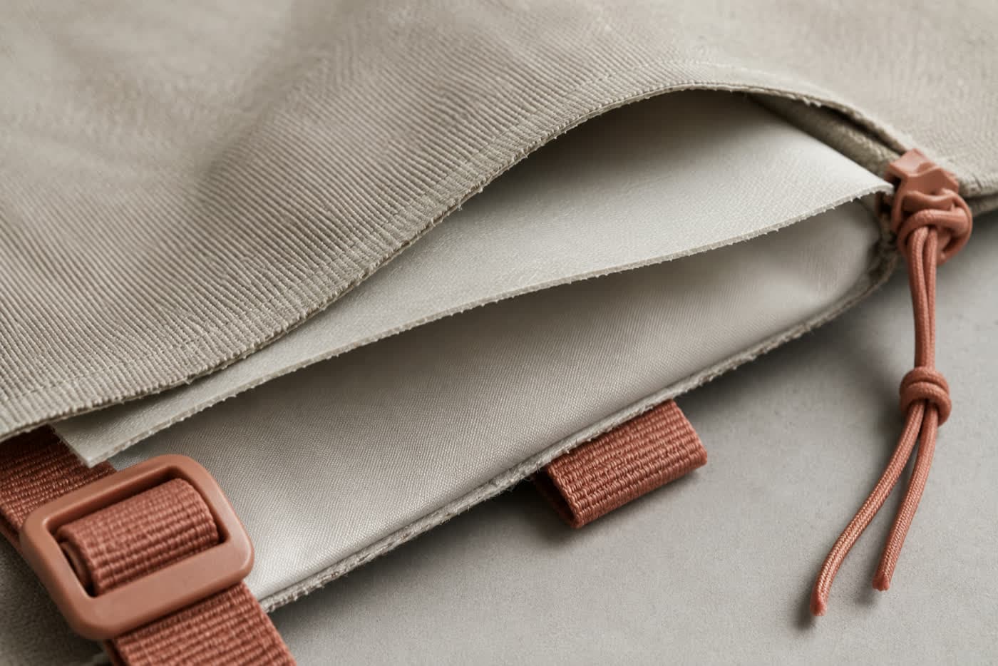 Cross-section showing the outer twill, the coating film and the wipe-clean lining